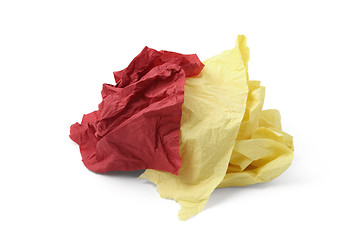 Image showing piece of yellow and red toilet paper