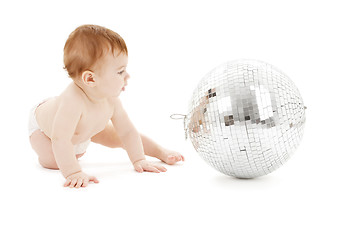 Image showing adorable baby boy with big disco ball