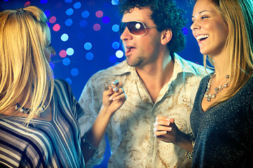 Image showing Friends clubbing