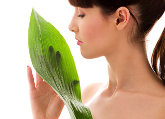 Image showing woman with green leaf