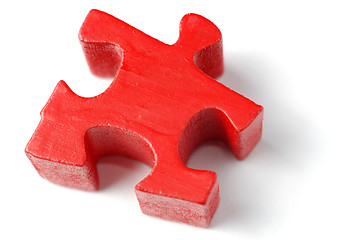 Image showing Single red puzzle piece