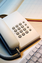 Image showing office phone and keyboard