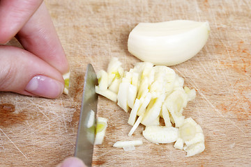 Image showing Chopping the Garlic