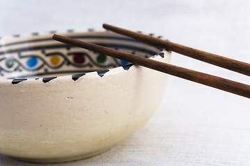 Image showing Dish and chopsticks