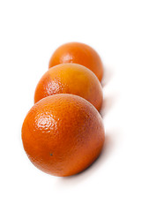 Image showing Three oranges line