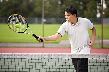 Image showing Asian tennis player