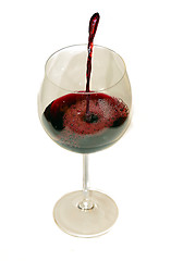 Image showing Pouring red wine