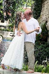 Image showing Bride and groom kissing.