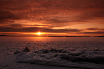 Image showing Sunset over frozen lake