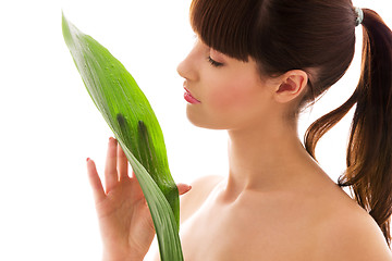 Image showing woman with green leaf