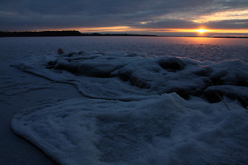 Image showing Sunset over frozen lake