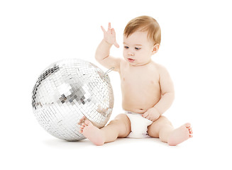 Image showing adorable baby boy with big disco ball