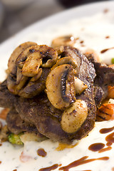 Image showing Juicy steak with mushrooms