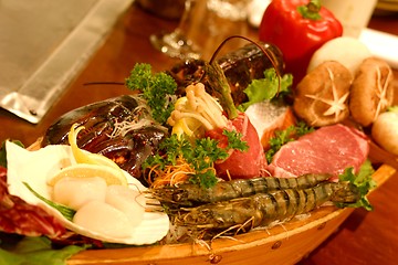 Image showing Boat sushi with an assortment of delicacies.