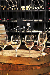 Image showing Wine  glasses and barrels