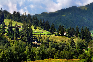 Image showing Clouds over mountain village