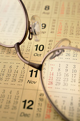 Image showing Calender and glasses