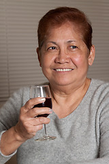 Image showing Having a glass of wine