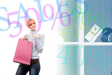 Image showing happy young girl with colored bags