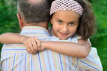 Image showing Kid and grandfather outdoors