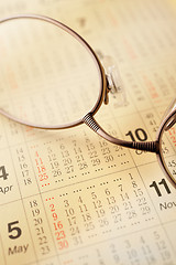Image showing Calender and glasses