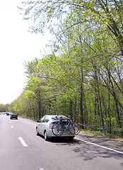 Image showing car carrying bikes