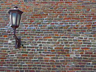 Image showing Brick wall with lantern