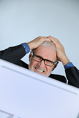 Image showing Stressed senior businessman