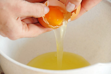 Image showing Egg breaking