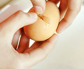 Image showing Egg breaking