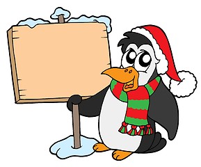 Image showing Christmas penguin with sign