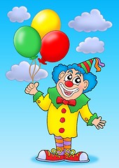 Image showing Clown with balloons on blue sky