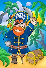 Image showing Pirate with parrot and treasure chest