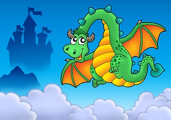 Image showing Flying green dragon with castle