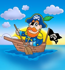 Image showing Pirate on boat with sunset