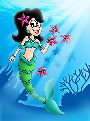 Image showing Dark hair mermaid with flowers