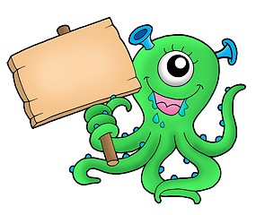 Image showing Cute monster with wooden sign