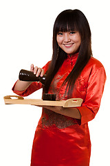 Image showing Serving saki