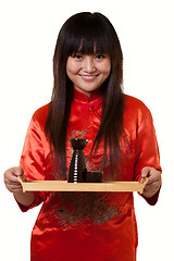 Image showing Serving saki