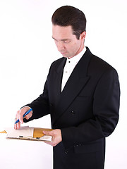 Image showing Man in Suit with Clipboard