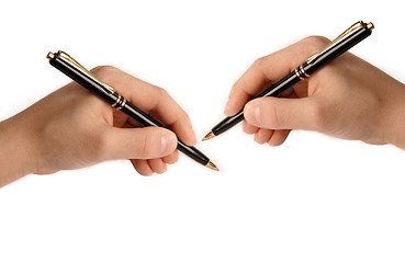 Image showing Lefthanded child writing on white paper