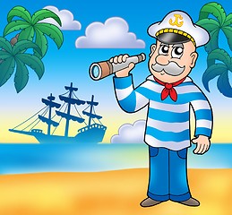 Image showing Sailor with spyglass on beach