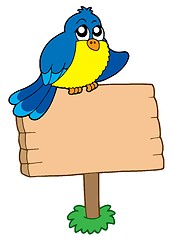 Image showing Wooden sign with sitting bird