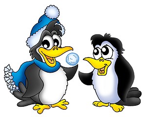 Image showing Two penguins with snowball