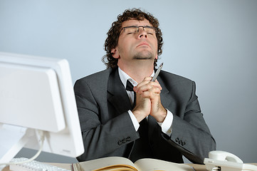 Image showing praying businessman