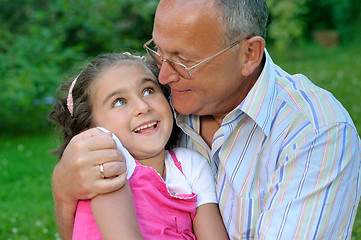 Image showing grandfather and kid outdoors