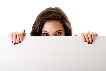 Image showing Young business woman with white board