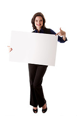 Image showing Young business woman with white board