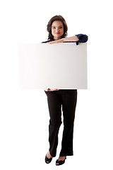 Image showing Young business woman with white board