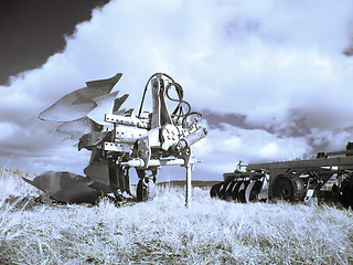 Image showing Plough machines  on field